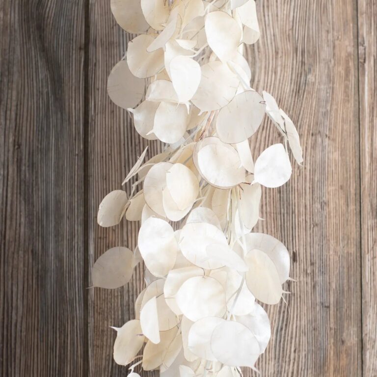 Close-up of greenery along the garland on this Dried Look Translucent Bleached Lunaria All Seasons