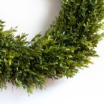Detail view of layered greenery detail from the Lifelike English Boxwood Leaf Front Front Door