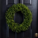The Lifelike English Boxwood Leaf Front Front Door Wreath shown in full, highlighting full wreath