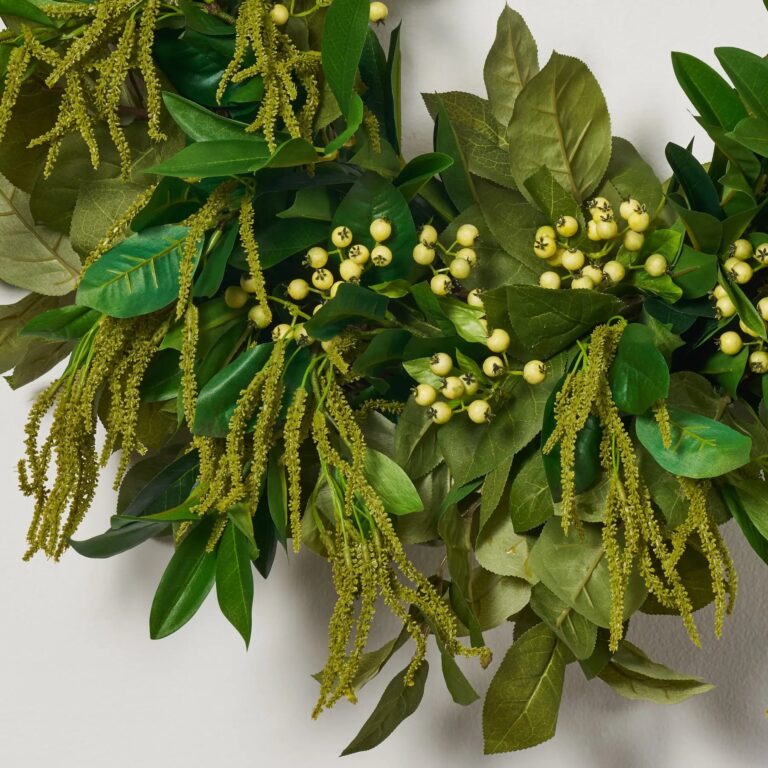 Close-up of blooms and berries on this Lush Life - Mixed Greenery Seasons Half Wreath