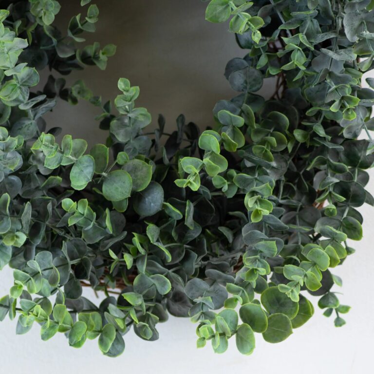 Close-up of blooms and berries on this Dark Marbled Green Faux Eucalyptus Front Door Wreath