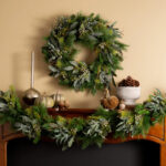 Second angle of the Seeded Eucalyptus and Christmas Pine Door Holiday Wreath focusing on blooms