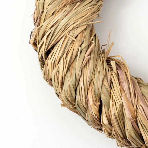 Close-up of blooms and berries on this All Season Wrapped Natural Jute Bow Option