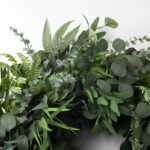 Alternate angle of the Deluxe Mixed Eucalyptus and Lux Extra Large Wreath showing wreath face