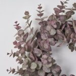 Close-up of blooms and berries on this Frosted Purple and Green Eucalyptus Seasons Spring Wreath