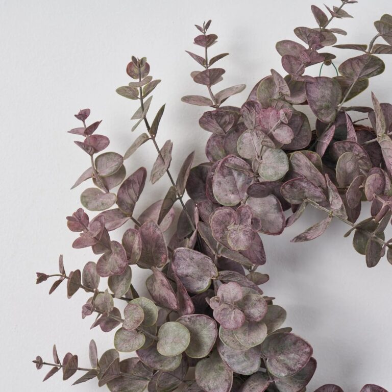 Close-up of blooms and berries on this Frosted Purple and Green Eucalyptus Seasons Spring Wreath