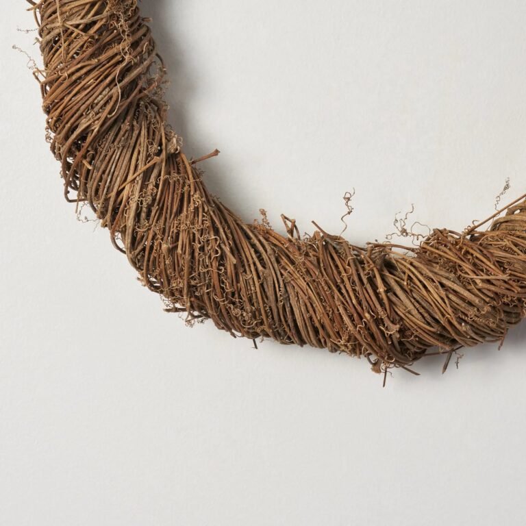 Close-up of blooms and berries on this All Season Wrapped Natural Grapevine Twig Everyday Wreath