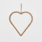 Alternate angle of the All Season Braided Natural Jute Hanging Wall Ornament showing wreath face