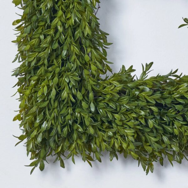 Close-up of blooms and berries on this Soft Touch Green Boxwood Square Front Door Wreath