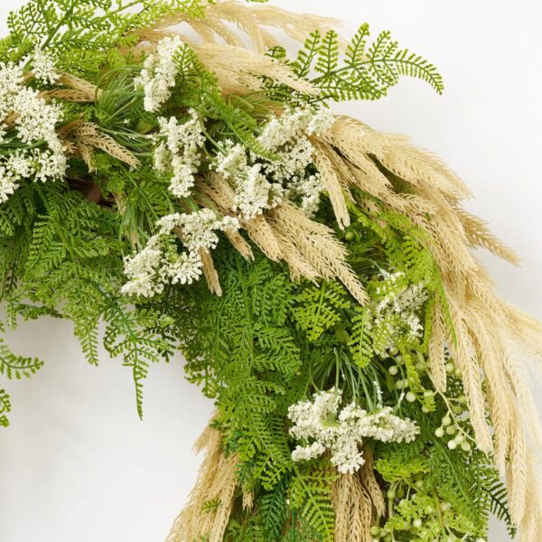 Close-up of blooms and berries on this Fern Queen - Draping Green Front Door Wreath