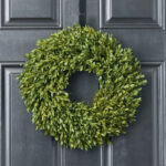 Detail view of layered greenery detail from the Small Realistic English Boxwood Leaf Front Door