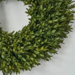Close-up of blooms and berries on this Small Realistic English Boxwood Leaf Front Door Wreath