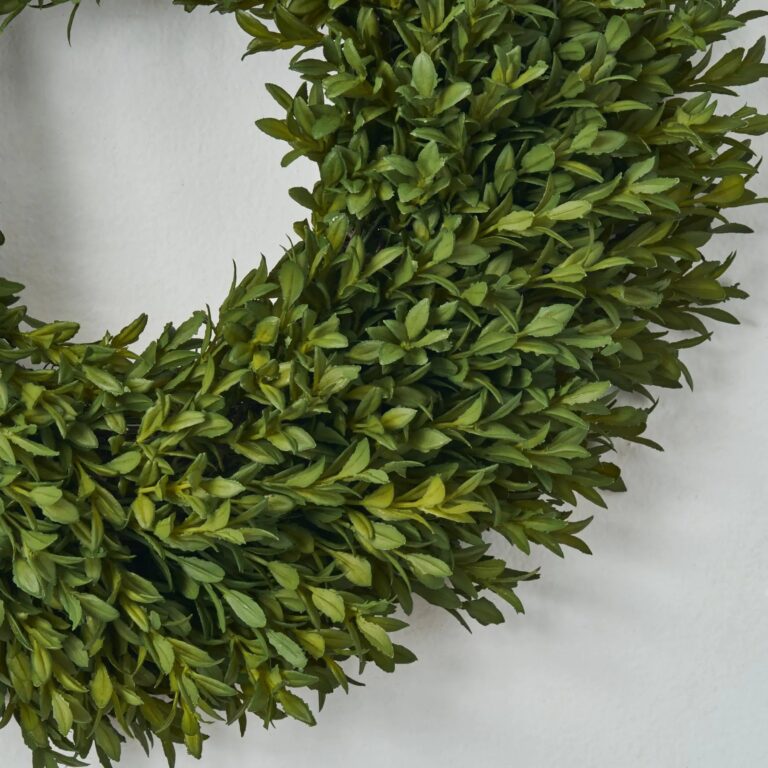 Close-up of blooms and berries on this Small Realistic English Boxwood Leaf Front Door Wreath