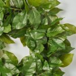 Alternate angle of the Real Touch Salal Leaf UV Door Greenery Wreath showing wreath face