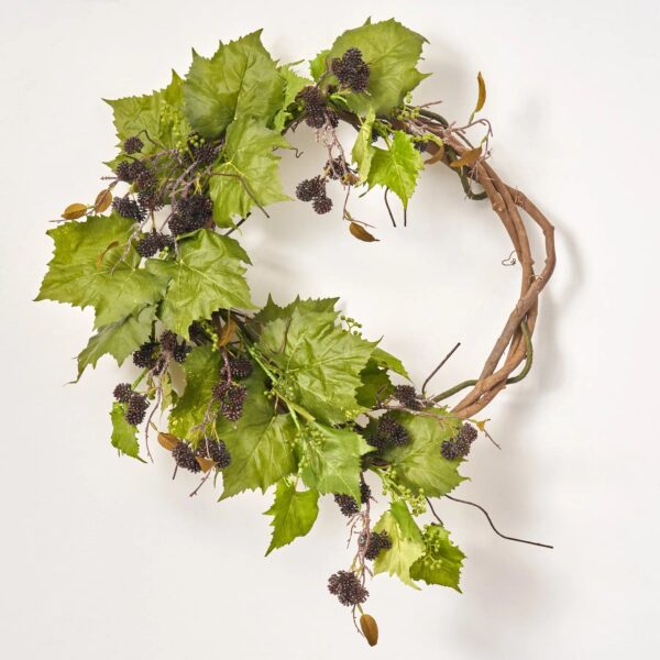 Close-up of blooms and berries on this Rustic Vineyards - Grape Leaf Broad Vine Wreath