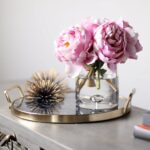 Close-up of vase silhouette detail on this Pink Real Touch Peony Floral Clear Glass Vase