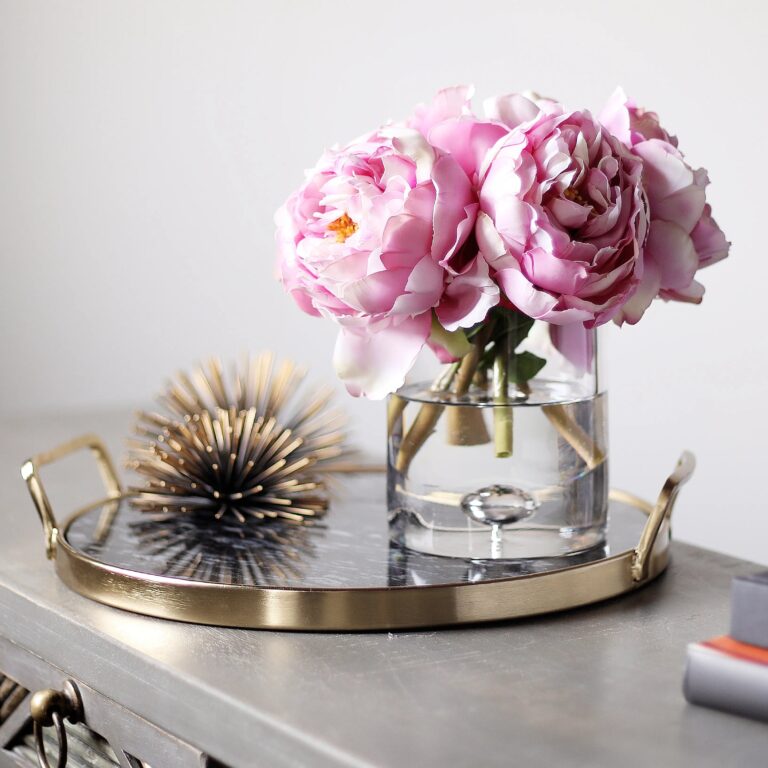 Close-up of vase silhouette detail on this Pink Real Touch Peony Floral Clear Glass Vase