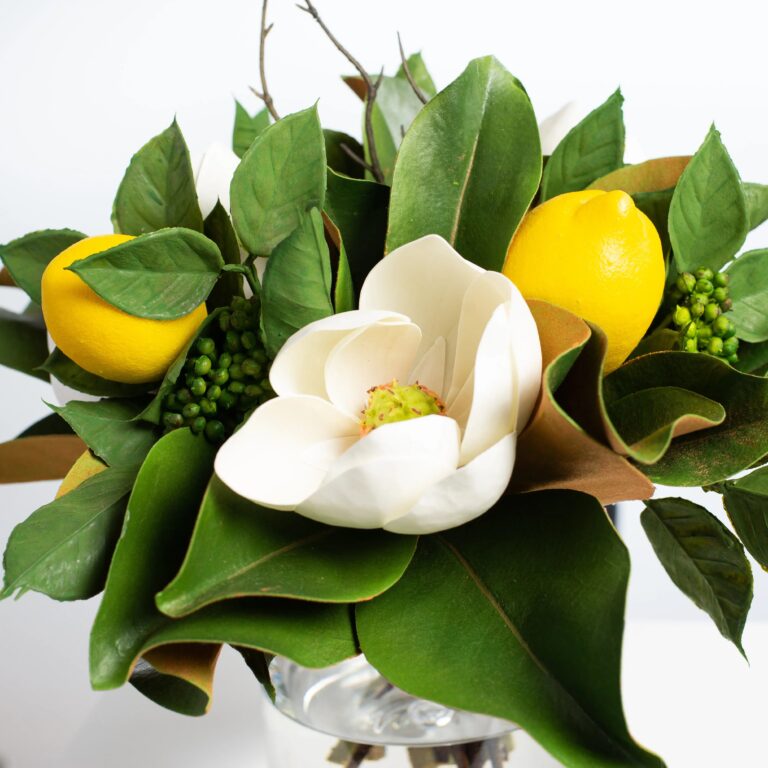 Close-up of vase silhouette detail on this Lemon and Magnolia Blooms, Everyday Water Illusion Arrangement