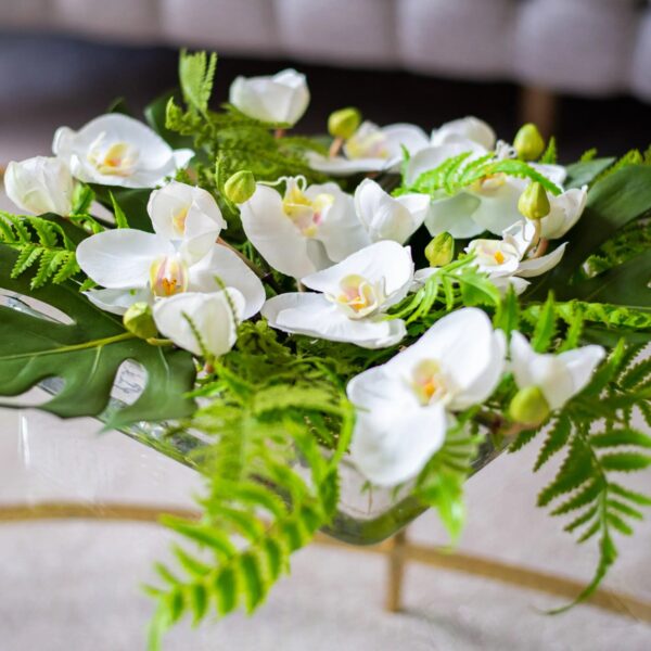 Close-up of vase silhouette detail on this White Orchid, Monstera Leaf, Mixed Everyday Floral Arrangement