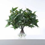 Alternate angle of the Large Eucalyptus Leaf and Seeding Water Illusion Arrangement showing bloom arrangement