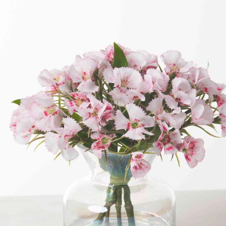 Close-up of vase silhouette detail on this Real Touch Mini Dianthus Wildflowers Fairy Bottle Vase