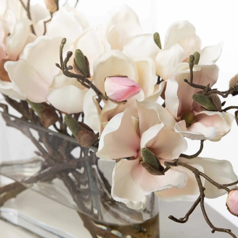 Close-up of vase silhouette detail on this Light Pink Magnolia Branch Blooms Water Illusion Arrangement