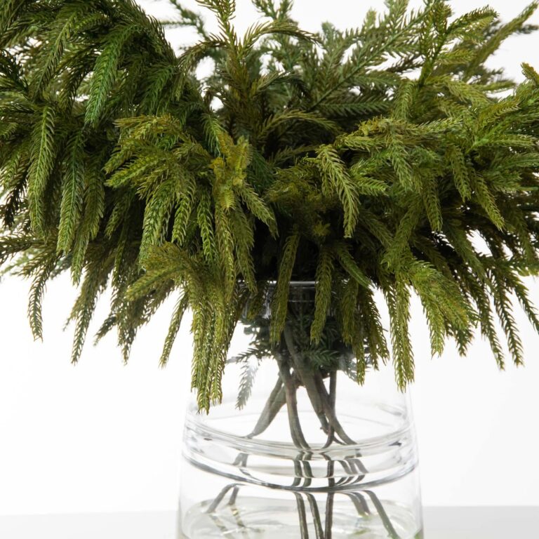 Close-up of vase silhouette detail on this Real Touch Norfolk Pine Branches Water Illusion Arrangement