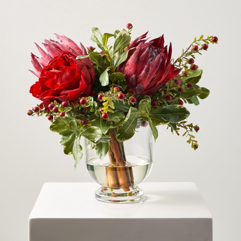 Close-up of vase silhouette detail on this Mi Amour - Real Touch Christmas Floral Arrangement