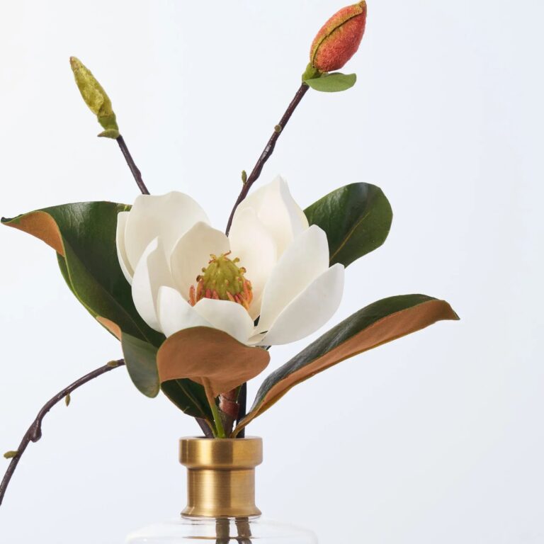Close-up of vase silhouette detail on this Real Touch Magnolia Bloom Water Illusion Arrangement