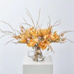 Golden Hour Magnolia Blooms and Branches Water Illusion Arrangement