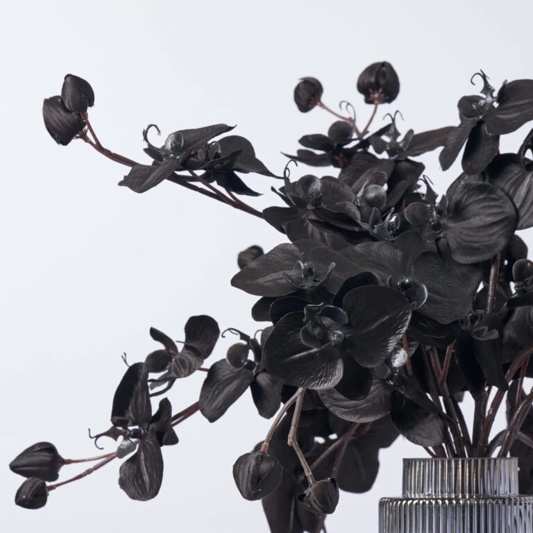 Close-up of vase silhouette detail on this Black Magic Orchid Arrangement Glass Chandelier Vase