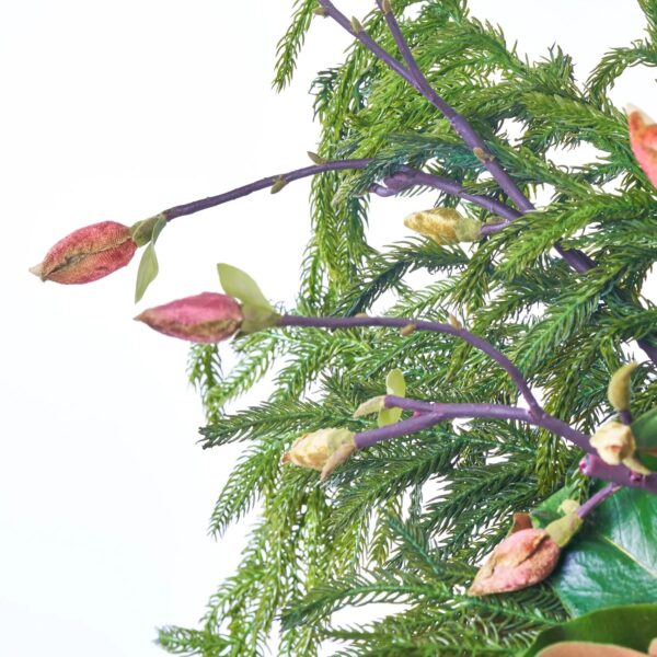 Close-up of vase silhouette detail on this Winter Tidings - Real Touch Holiday Greenery Arrangement