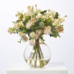 Fuzzy Navel - Peach Thistle Pods and Blush Waxflower Ball Amber Vase - Peach