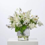 Alternate angle of the Angelic Blooms - White Lilac Water Illusion Arrangement showing bloom arrangement