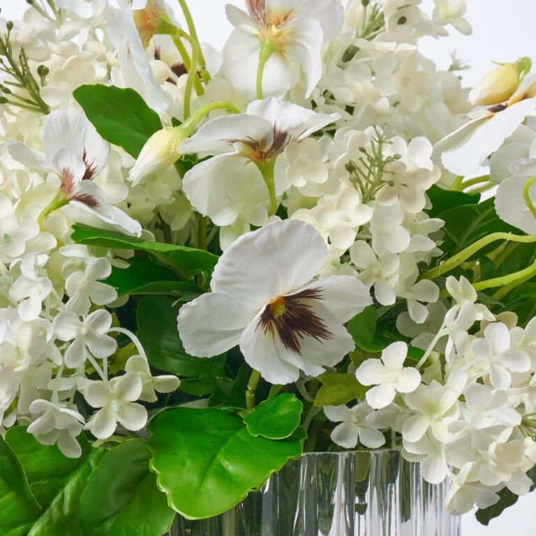 Close-up of vase silhouette detail on this Angelic Blooms - White Lilac Water Illusion Arrangement