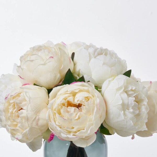 Close-up of vase silhouette detail on this Full Bloom Real Touch Mixed Water Illusion Arrangement