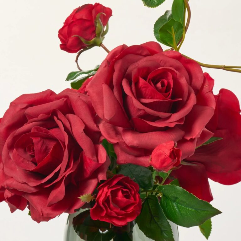Close-up of vase silhouette detail on this Real Touch Red Diana Roses Smoke Glass Vase