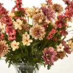 Close-up of vase silhouette detail on this Autumn Wildflower Bouquet - Rust Water Illusion Arrangement