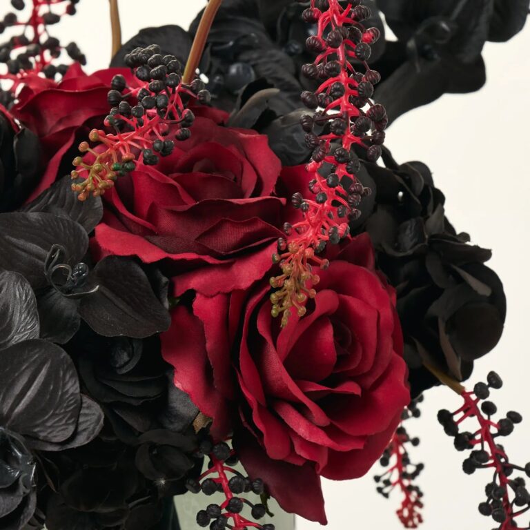 Close-up of vase silhouette detail on this Gothic Romance Noir - Red Water Illusion Arrangement