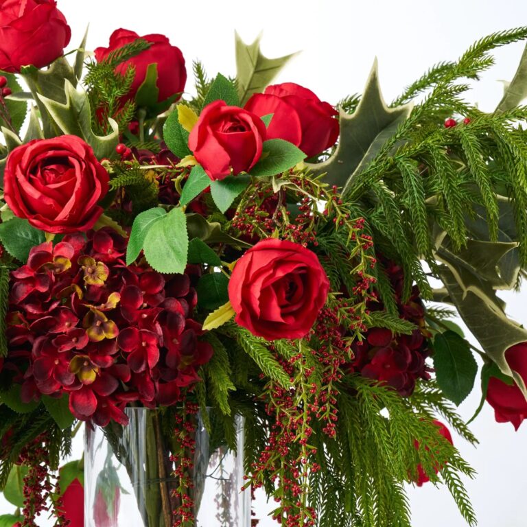 Close-up of vase silhouette detail on this Radiant Ruby Noel - Red Water Illusion Arrangement