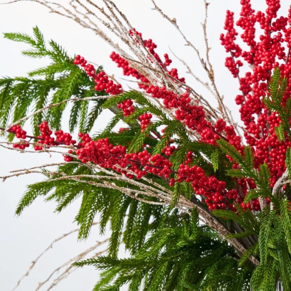 Close-up of vase silhouette detail on this Winter's Gifts - Red Ilex Vase Holiday Arrangement