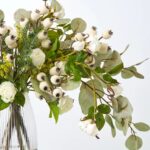 Close-up of vase silhouette detail on this Winter Wishes - Real Touch Rigid Glass Vase