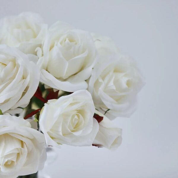 Close-up of vase silhouette detail on this White Silk Rose Bouquet Water Illusion Arrangement