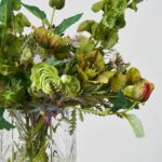 Close-up of vase silhouette detail on this Verdant Meadow - Mixed Wild Water Illusion Arrangement