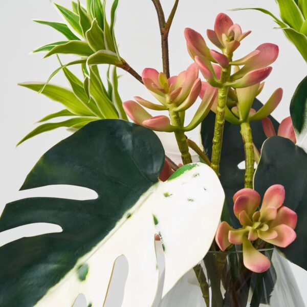Close-up of vase silhouette detail on this Tropical Muse - Green Albino Illusion Centerpiece Arrangement