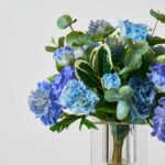Close-up of vase silhouette detail on this Little Luxuries - Real Touch Crystal Block Vase