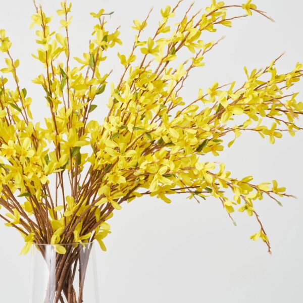 Close-up of vase silhouette detail on this Lifelike Yellow Forsythia Branches Water Illusion Arrangement