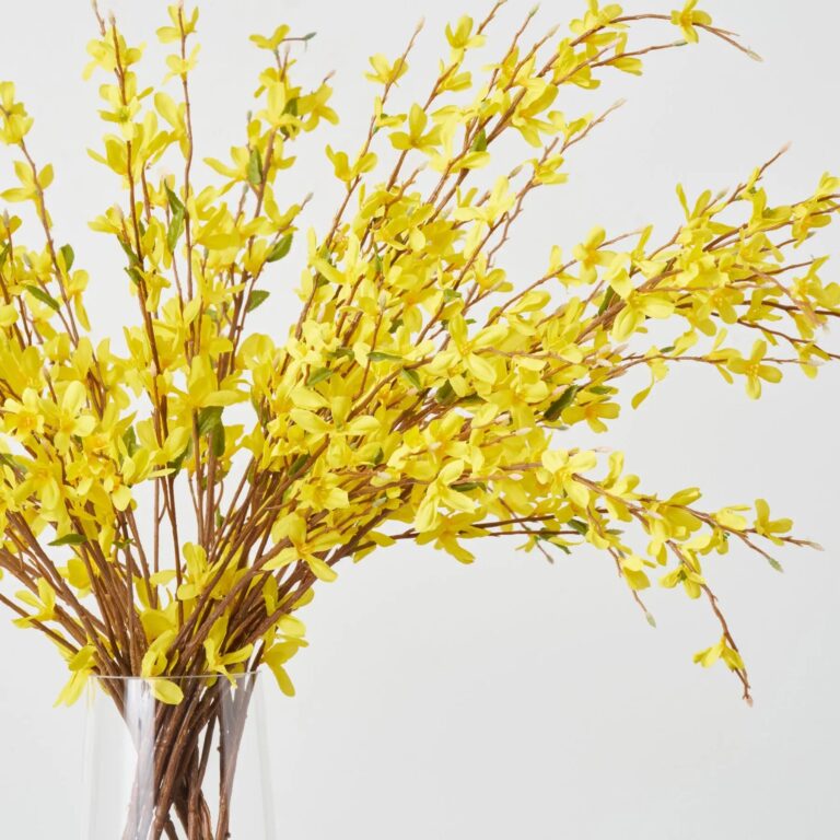 Close-up of vase silhouette detail on this Lifelike Yellow Forsythia Branches Water Illusion Arrangement