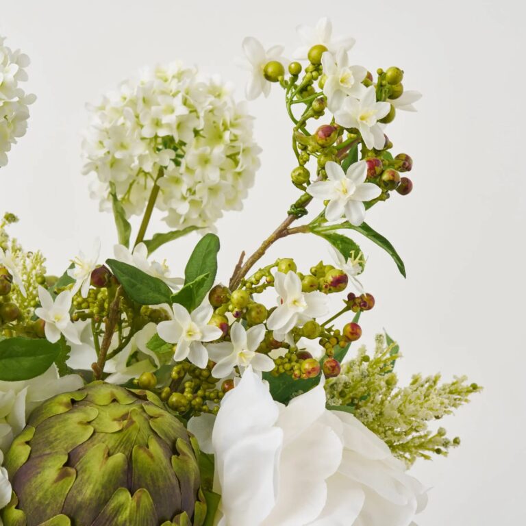 Close-up of vase silhouette detail on this Greenery Gardens - White Peony, Water Illusion Arrangement