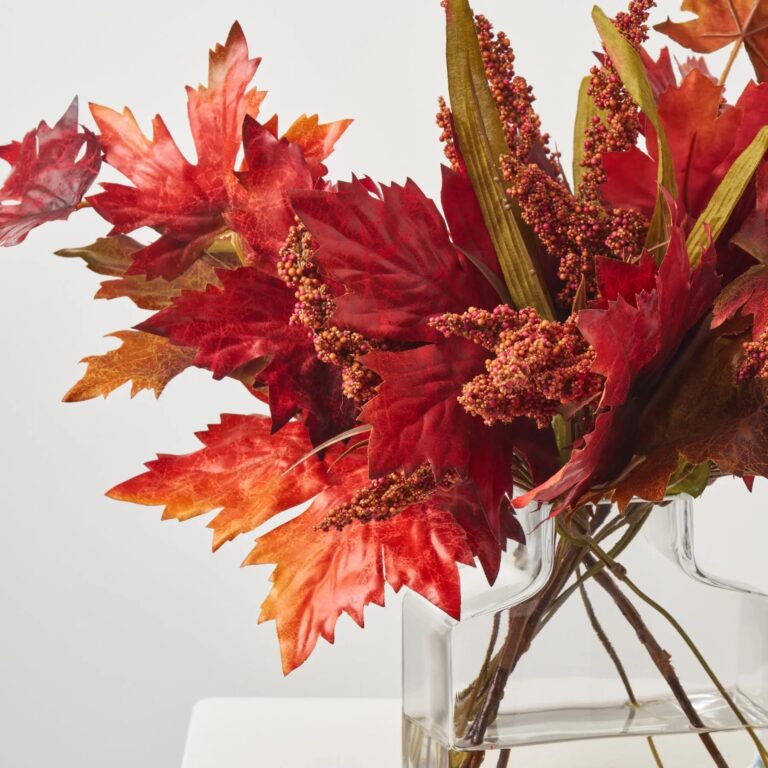 Close-up of vase silhouette detail on this Mixed Fall Brown and Burgundy Water Illusion Arrangement